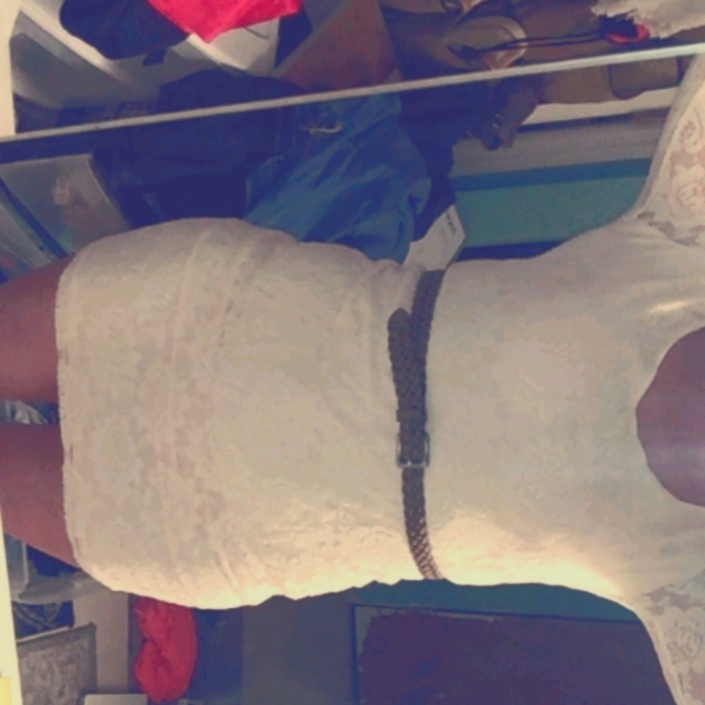 Cream colored lace dress that come up past knees